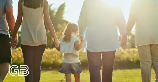 family walking hand in hand